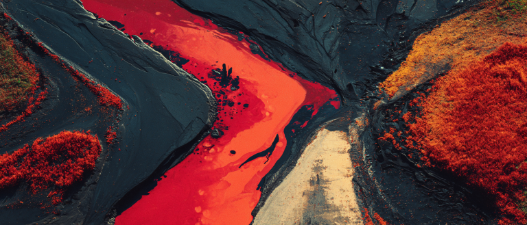 Forked river of mercury splitting across dark basalt, left third pure navy void for title